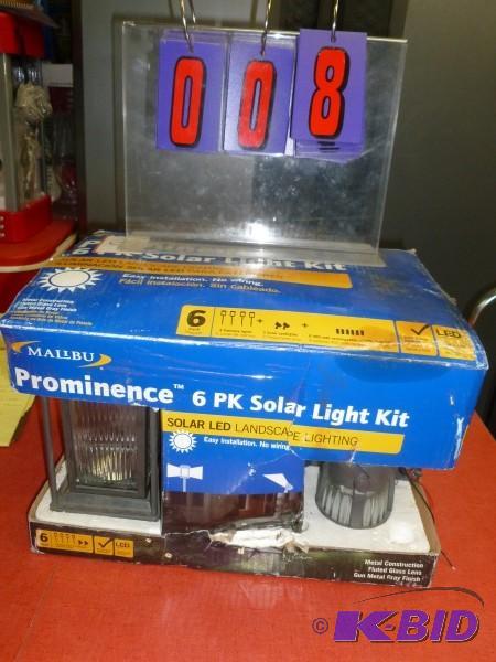 lot 8 image: Malibu 6 pack solar light kit. As shown. Term...