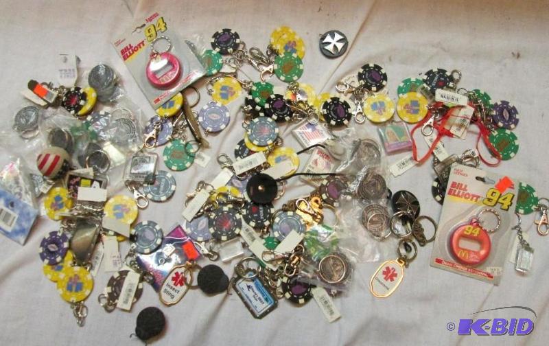 lot 143 image: mixed lot of poker pieces key chains and othe...