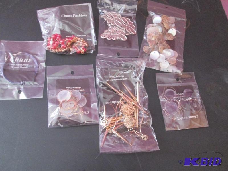 lot 185 image: lot of earrings brand new- great for resale...