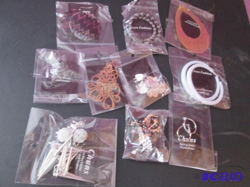 lot 190 image: lot of hoop earrings brand new- great for res...