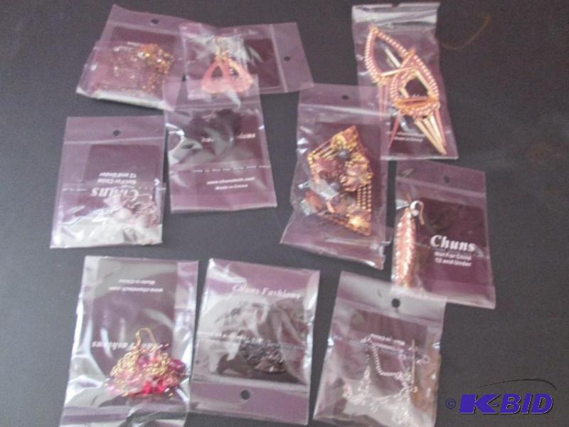 lot 195 image: lot of earrings brand new- great for resale...
