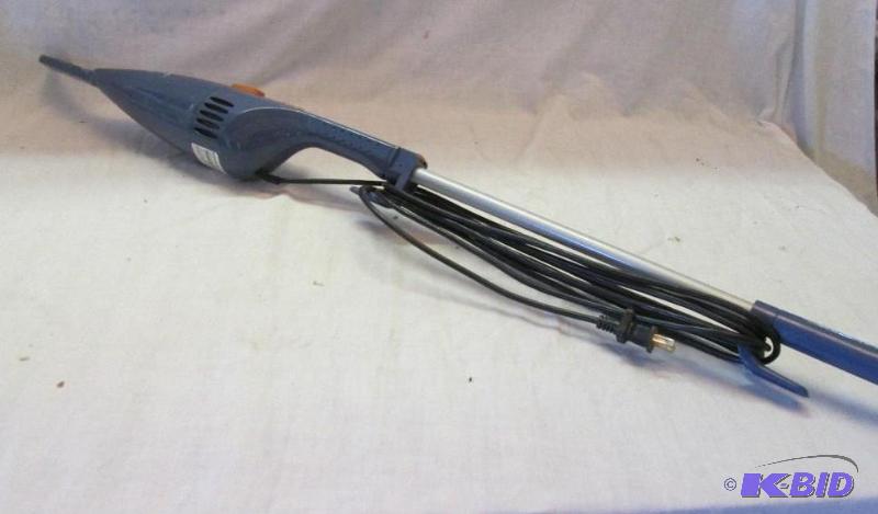 lot 209 image: bissell feather weight hand held bagless vacu...