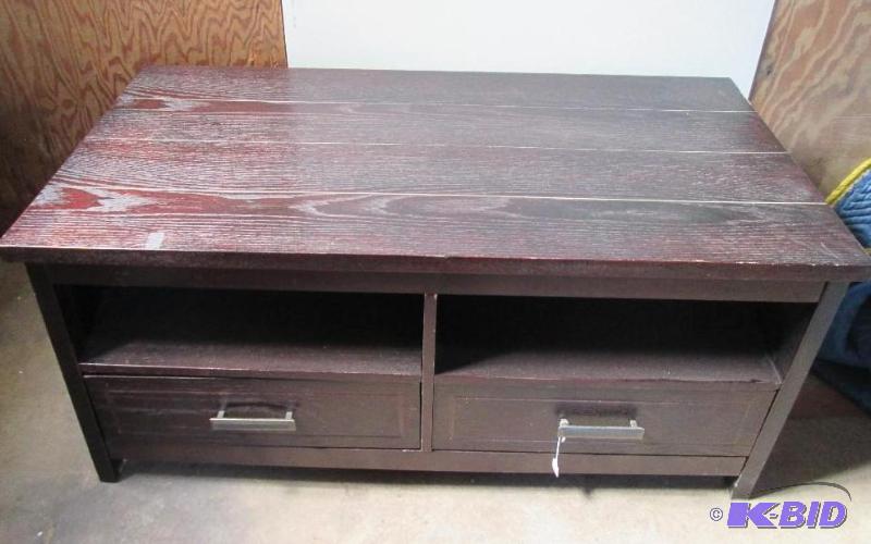 lot 218 image: dark colored TV or low table 42 x 22 19...