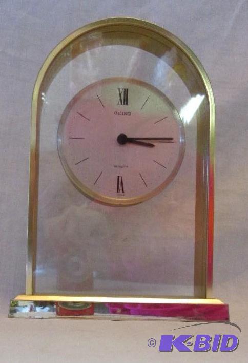 lot 287 image: seiko quartz clock runs off AA batteries...