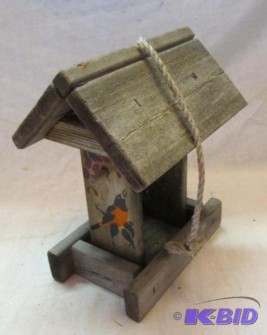 lot 36 image: wooden bird house and feeder with rope to han...