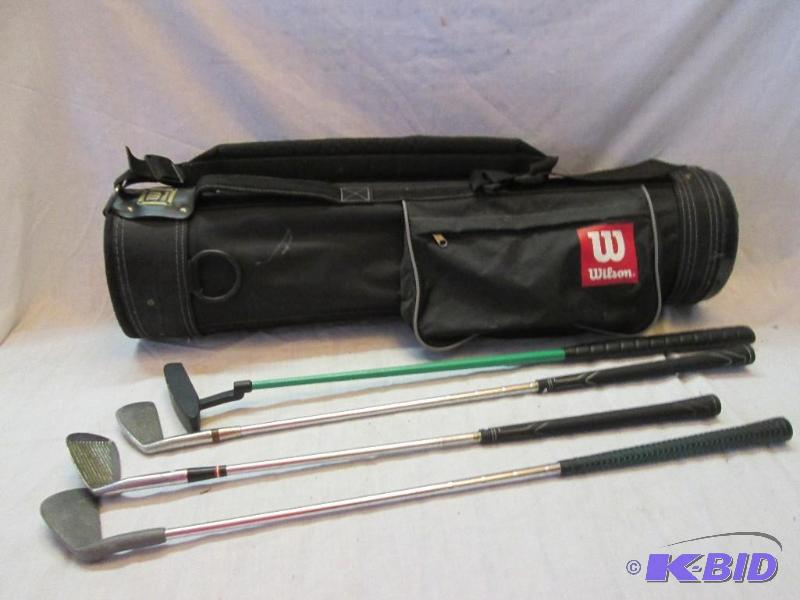 lot 37 image: wilson golf bag 3,7,9, iron and a putter...