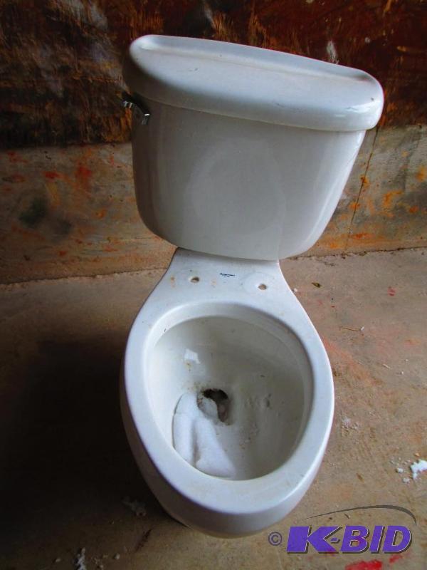 lot 447 image: American Standard toilet flushing mechanism ...