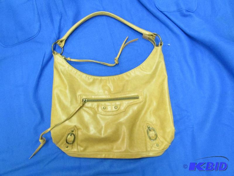 lot 458 image: Brown purse, long handle and zippered front p...
