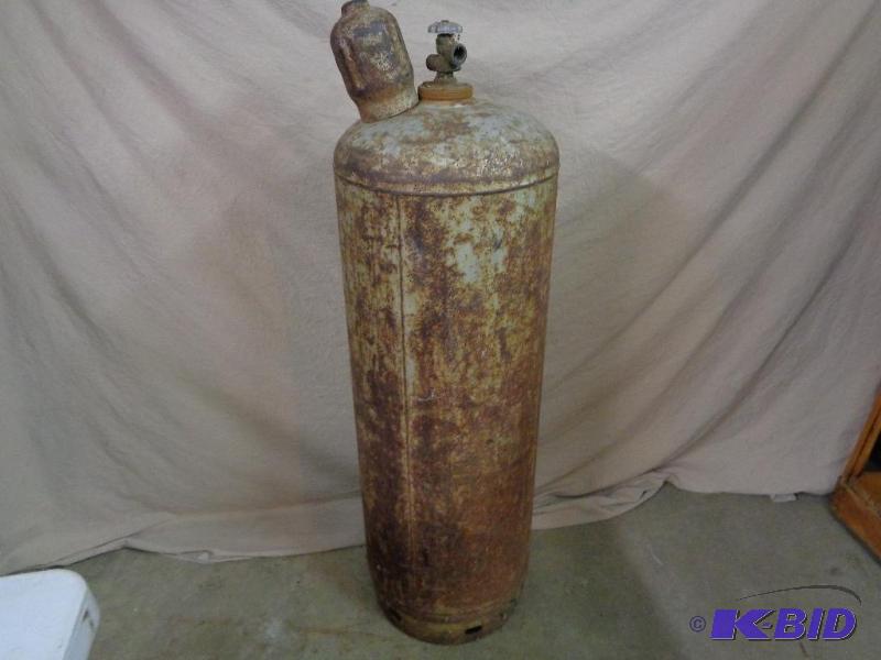 lot 10 image: 100 Lb Empty Propane Tank. Female threads, wi...