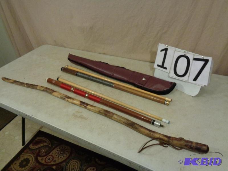 lot 107 image: Wood Walking Stick, Pool Sticks, and Case....