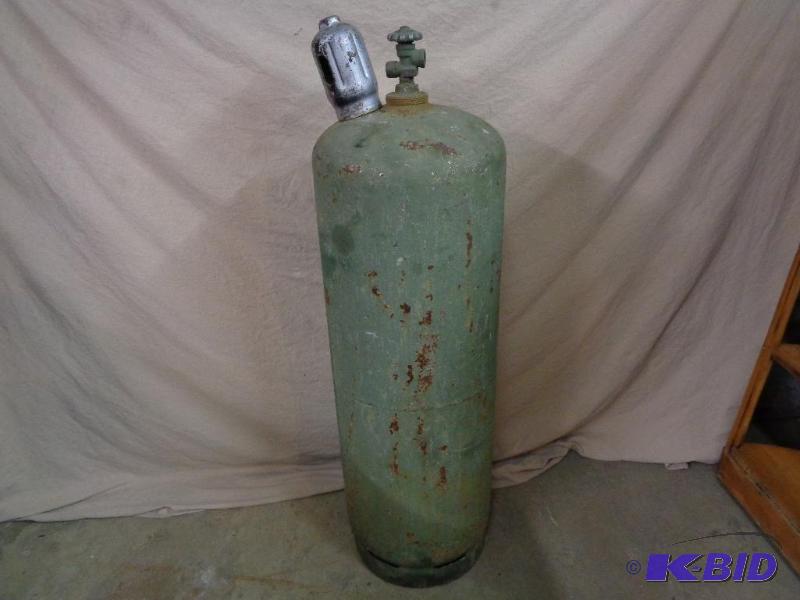 lot 11 image: 100 Lb Empty Propane Tank. Female threads, wi...