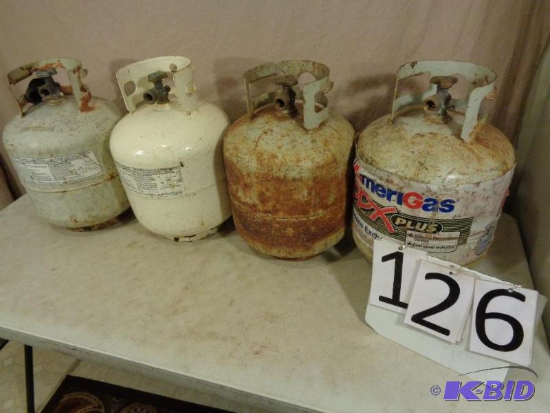 lot 126 image: 4 20lb Propane Tanks. 3 Have New style OPD Va...