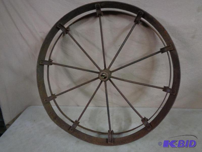 lot 13 image: Steel Wagon Wheel. Approx. 30" diameter...