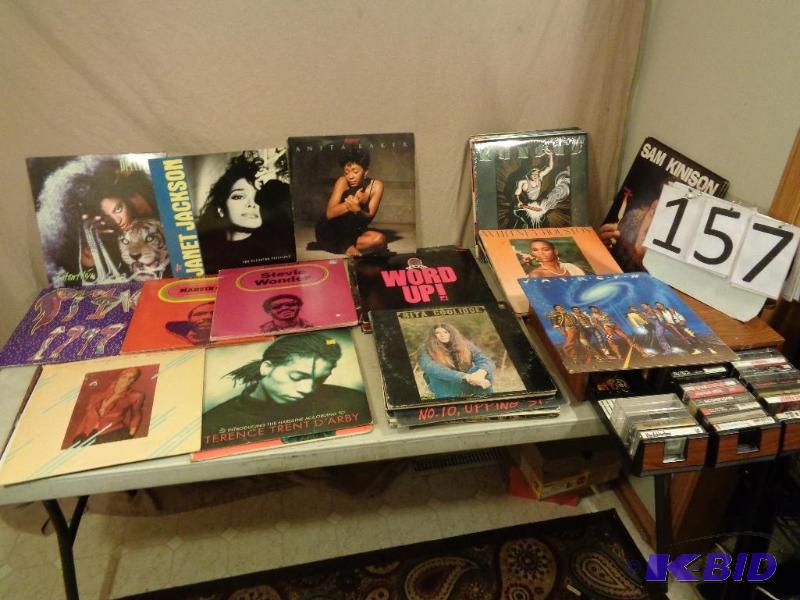 lot 157 image: Lot of Assorted Records and More. Prince, Jan...