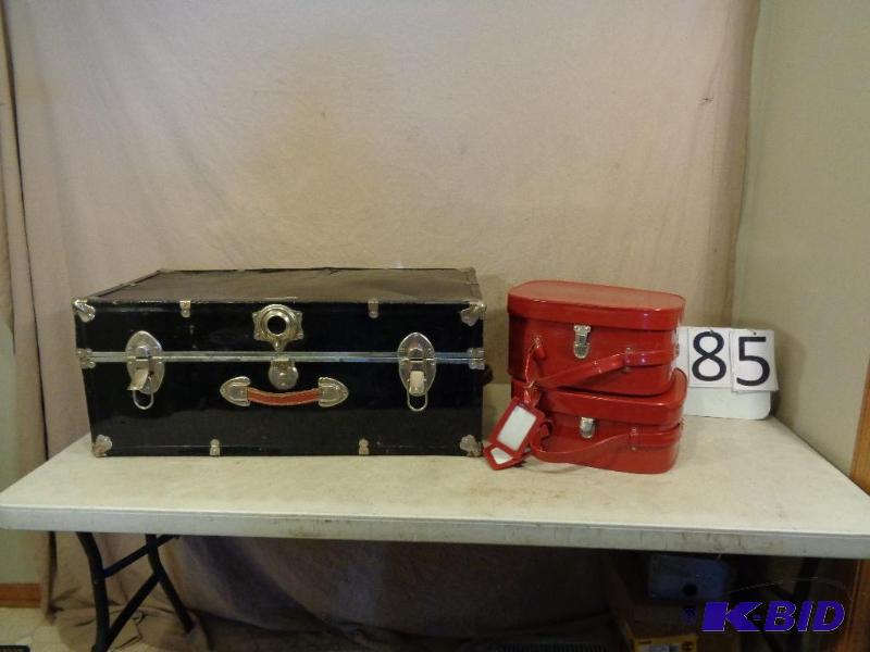 lot 185 image: Trunk and 2 Red Cases. Scratches, scuffs, sur...