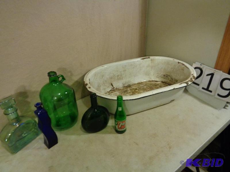 lot 219 image: Old Large Washtub and Assorted Glass Bottles....