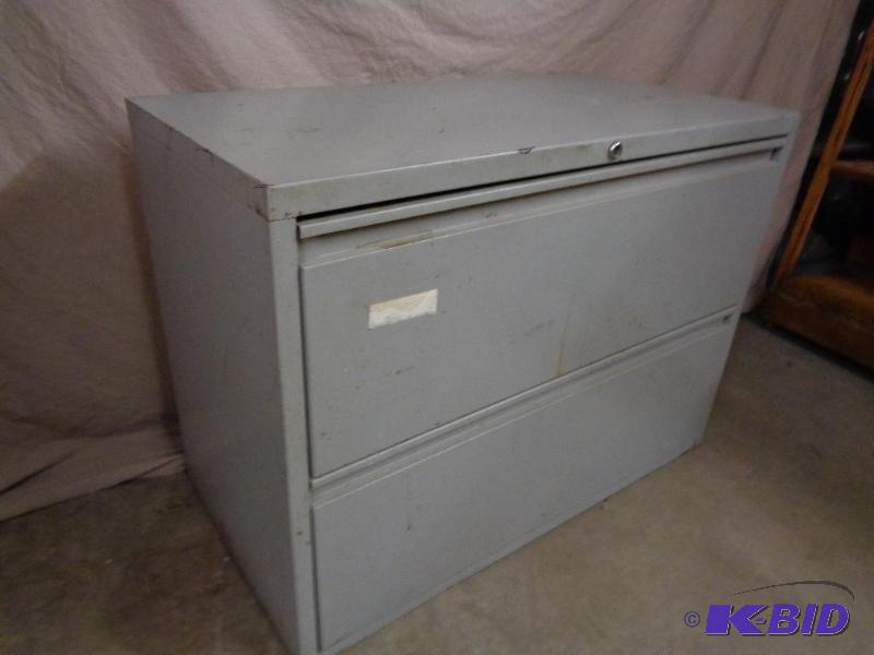 lot 27A image: 2 drawer lateral file cabinet. Steel. Scuffs,...