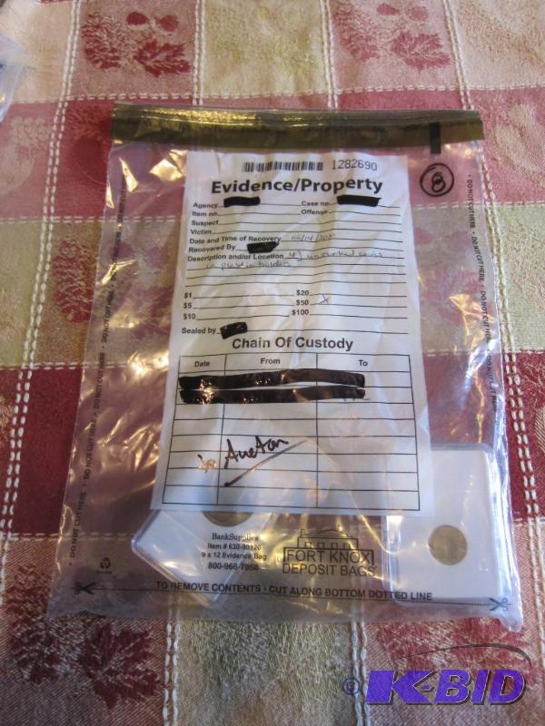 4 UNMARKED COINS IN EVIDENCE BAG