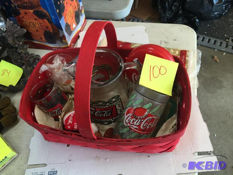 lot 100 image: Coca-Cola items, basket full...