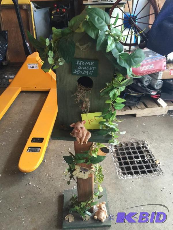 lot 101 image: Bird house lawn ornament...