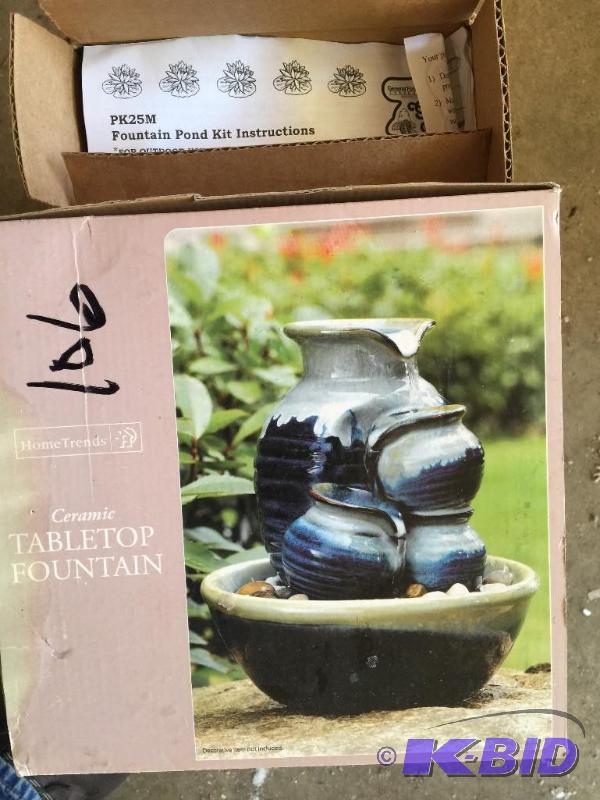 lot 106 image: Tabletop fountain and pump...