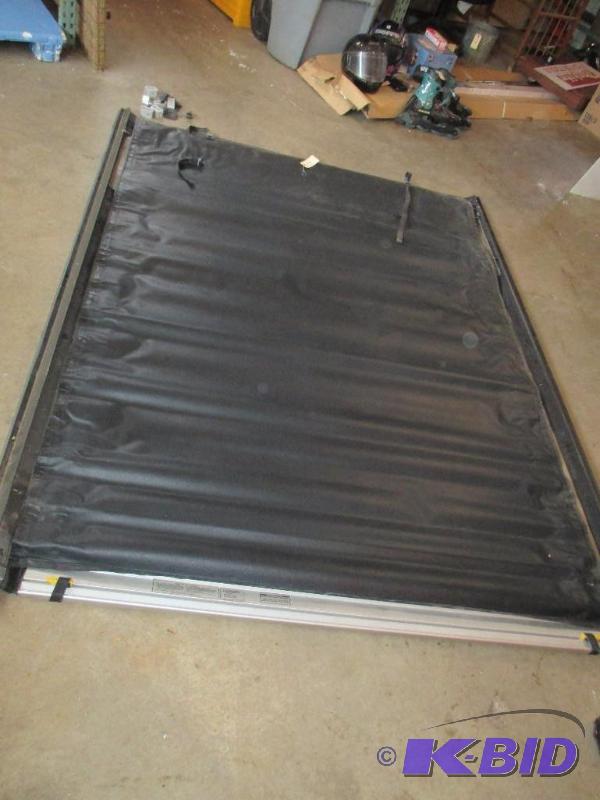 lot 3 image: Ford pickup, 2006 or newer tonneau cover with...