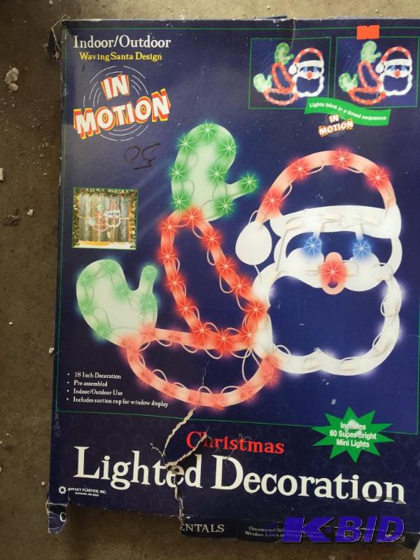 lot 50 image: Light up in-motion Santa decoration...