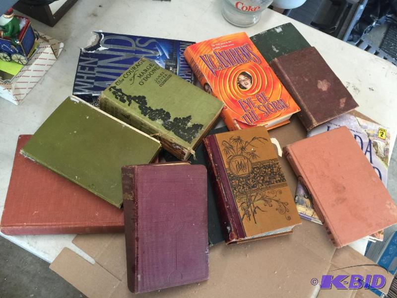 lot 75 image: Vintage and Modern books, one has a little mo...