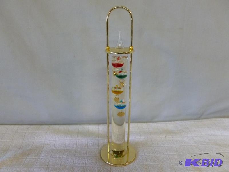 lot 118 image: Large brass and liquid filled glass thermomet...