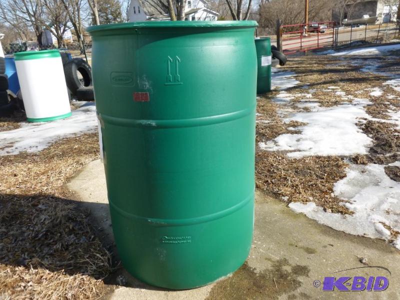 lot 137 image: Large 55 gallon plastic drum, comes with two ...