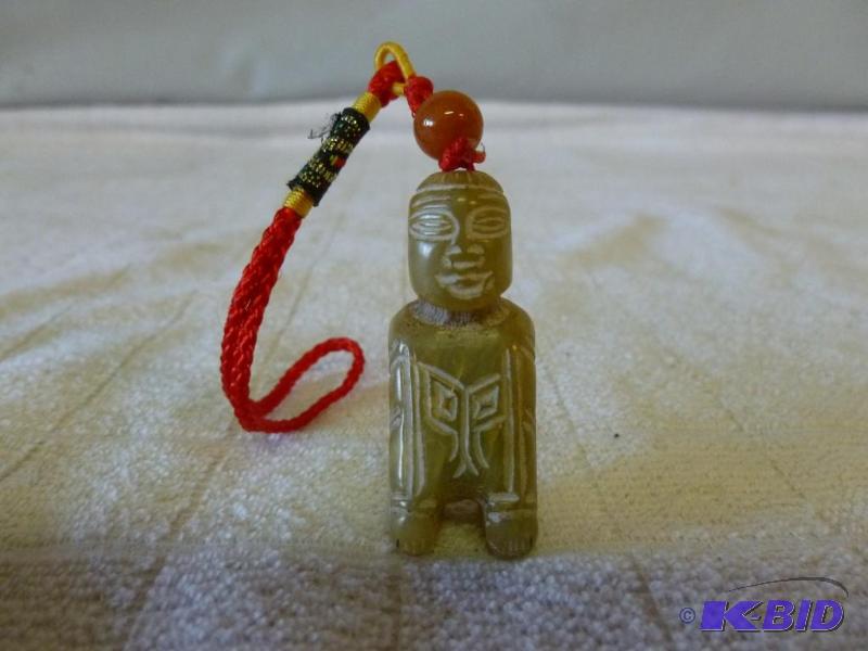 lot 15 image: Hand&nbspcarved stone ornament, measures 6.5...