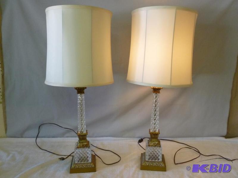 lot 17 image: A pair of vintage cast brass and crystal glas...