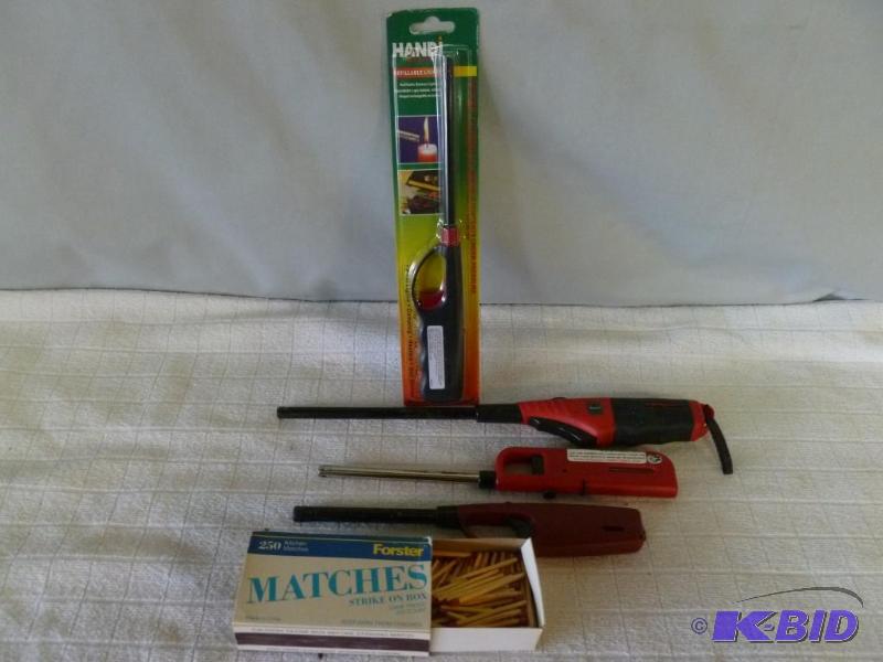 lot 42 image: Lot of long lighters and a box of wooden matc...