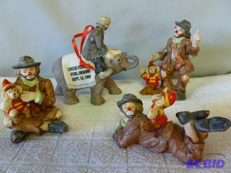 lot 85 image: Lot of four Emmett Kelly Jr. porcelain figuri...