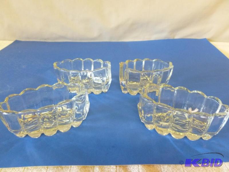lot 92 image: Lot of four heavy glass stove top spoon holde...