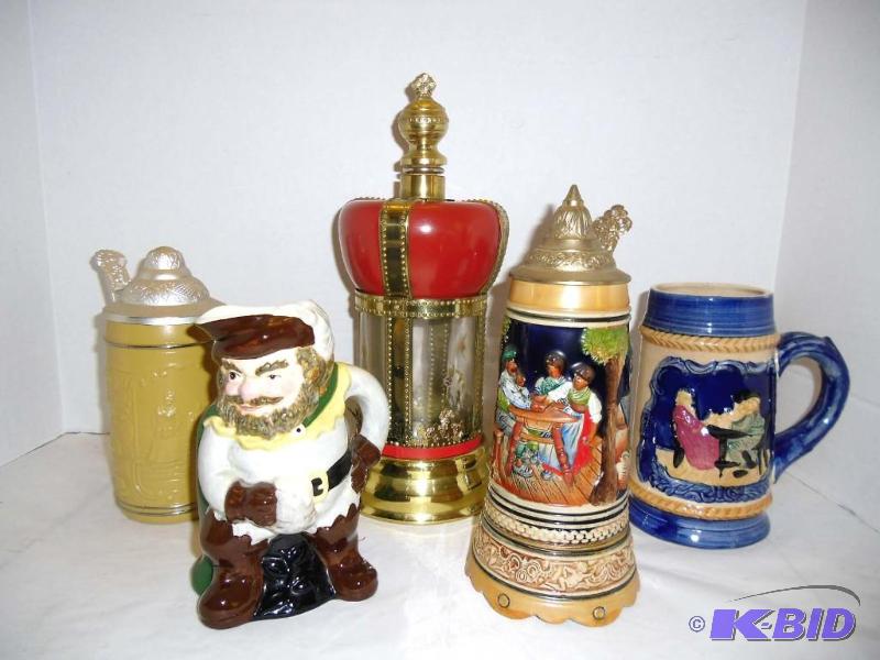 lot 19 image: How Dry I Am. . . International Beer Steins & a Musical Decanter