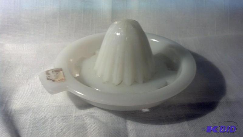 REAMER, WHITE IN COLOR...