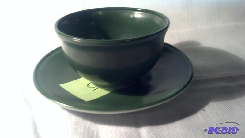 OVIDE, CUP AND SAUCER, GREEN IN COLOR...
