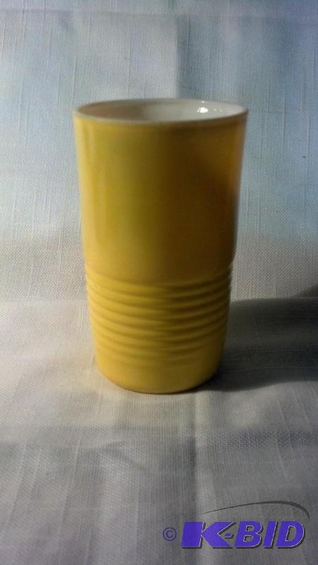 TUMBLER, YELLOW IN COLOR...