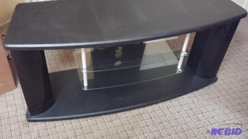 Black with GLASS shelving TV Stand. This stan...