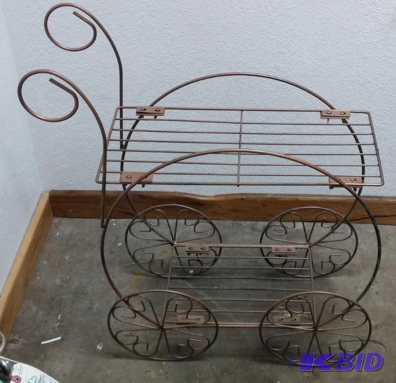 Vintage Wrought Iron Buggy shaped Plant Stand...