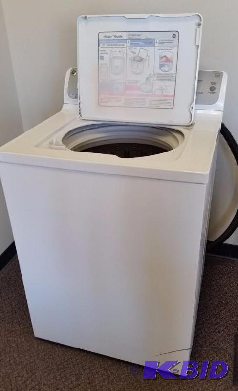 lot 6 image: GE 3.6 DOE cu. ft. Stainless Steel Large Capacity washer.  Used, tested and stated by consignor it w