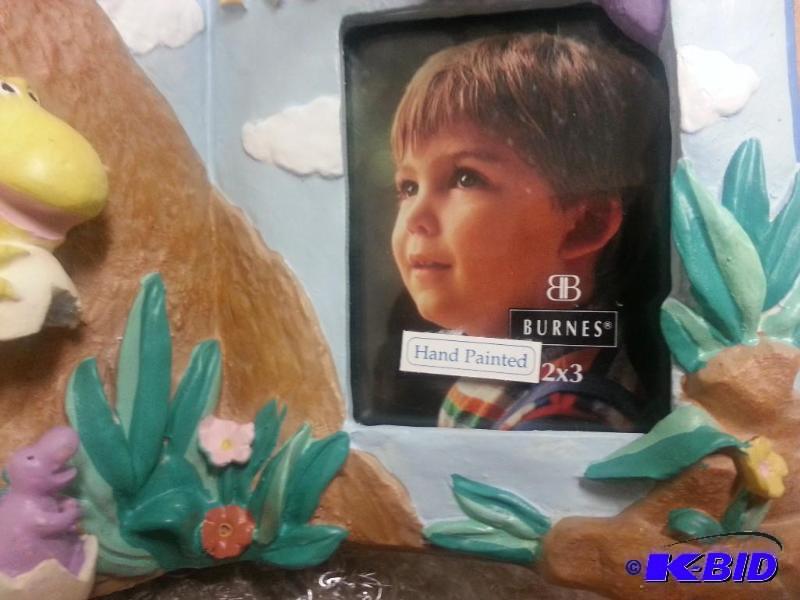 New still in box, Hand painted Dinosaur Frame...
