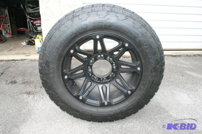 lot 17 image: Set of 4 Truck Tires on Rims