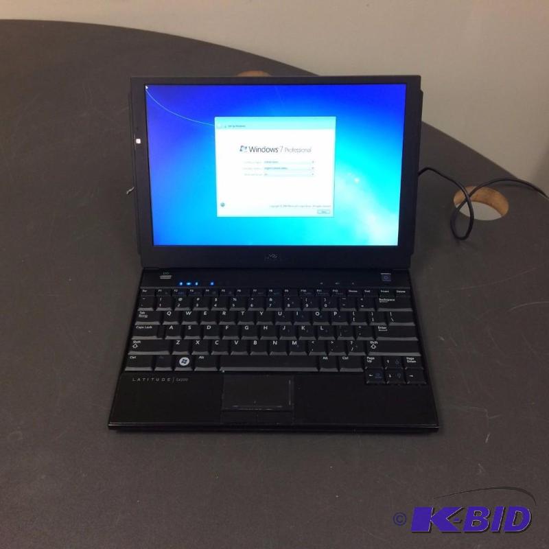 lot 2 image: Dell Latitude E4200 Personal Laptop Operating...