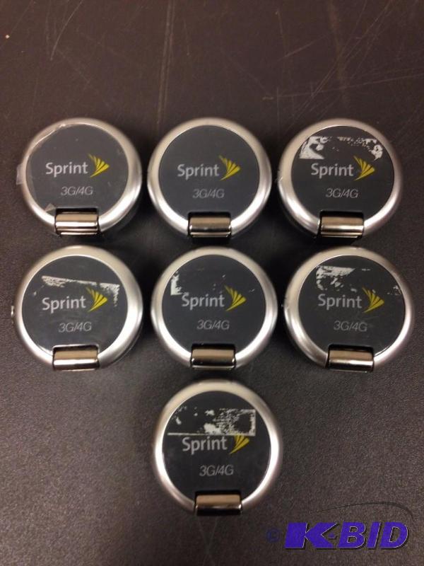 lot 9 image: Lot of (7) Sprint Sierra Wireless 250U USB 3G...