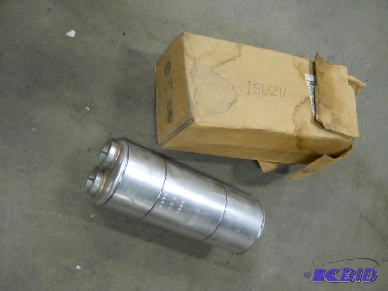 lot 42 image: NEW NAPA 22637 Muffler. Fits Isuzu NPR.