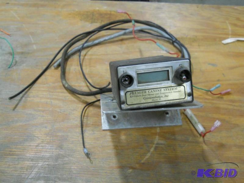 lot 6 image: Criminalistic K9 System. Police Car Door Opener and Temperature Monitor.