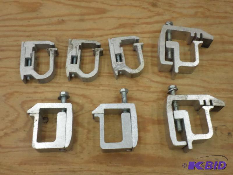 Box Of (7) Aluminum Topper Clamps...