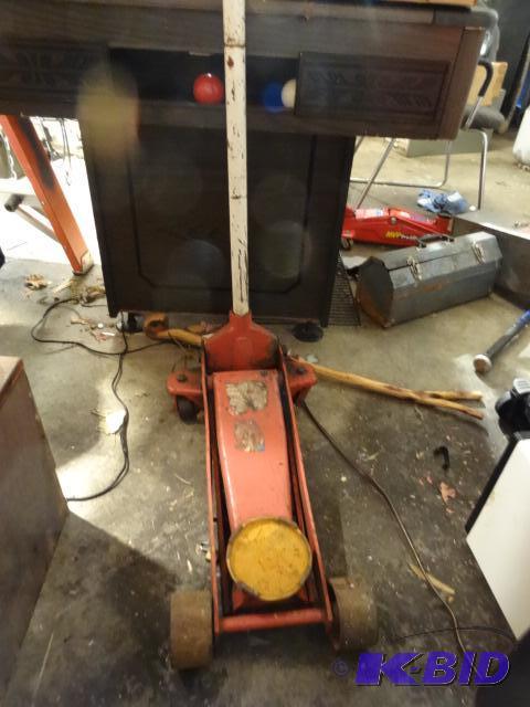lot 103 image: Rolling Floor Jack Works...